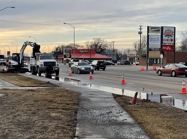 A crew on Saturday afternoon works to repair a water main along 23rd Street in Columbus.
