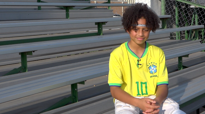 Determined 7th-grader reaches high despite all challenges